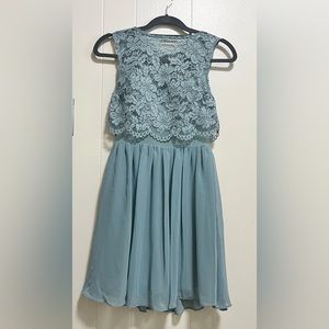 - Short fit, flare dress Blue, sleeveless, high neck, inserted bra